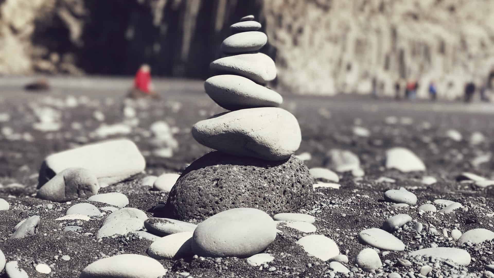 Stacked rocks symbolizing patience